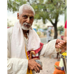 Donate food to Sadhus residing in and around Govardhan