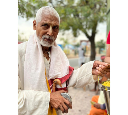 Donate food to Sadhus residing in and around Govardhan